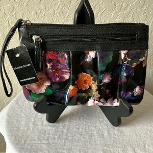 Wilson Leather: Mundi Black Floral Wristlet- flaws